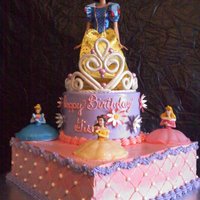A Cake Fit For A Princess Chocolate cake with strawberry filling, SMBC with gum paste flowers and tiara and pearl dragees. This was my first of many tiaras. I had...