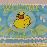 Rubber Ducky 9x13 cake, Light blue buttercream airbrushed with bubbles and waves, Cricut cut letters.