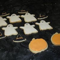 My 1St Cookies Here are my first decorated cookies. I did not have a chance to finish the pumpkins, but I'm happy with the results.