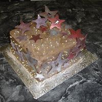Starry Night! This cake was for a family reunion. The stars are made from candy melts and dusted with luster dust