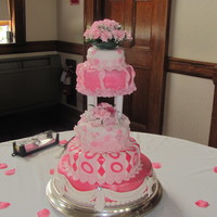 Funky Pink And White Wedding Cake Tiered cake modeled after Wilton's cake "WILDEST DREAMS". This cake was mixed bottom tiered was chocolate with chocolate...