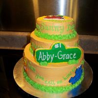 Sesame Street Buttercream icing, FBCT characters, NFSC street plaque. The lyrics to the Sesame St song are written around the tiers.