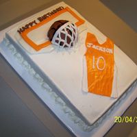 Ut Basketball Cake 9X13 Buttercream with MMF accents. Ball is mini ball pan.