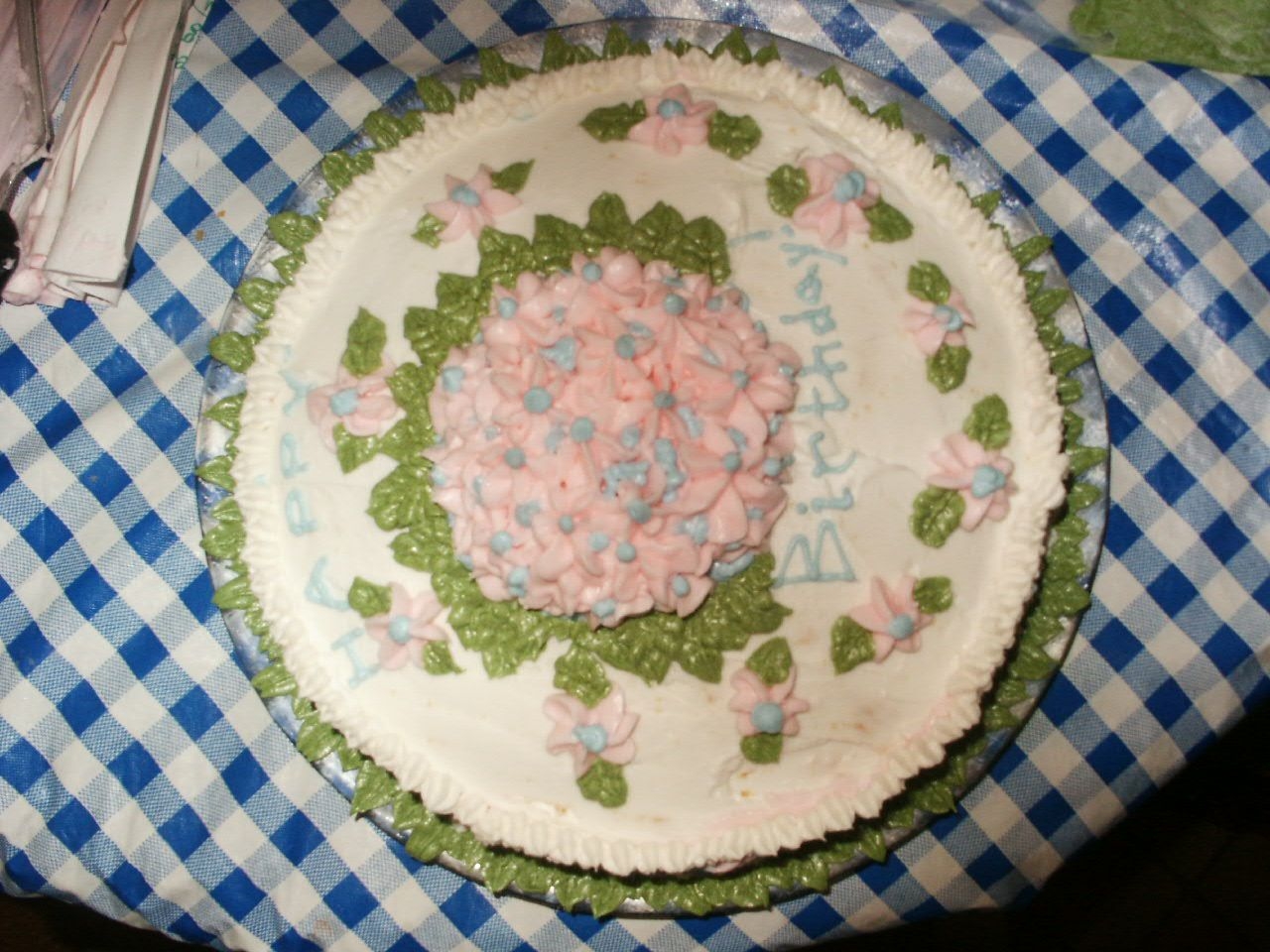 Mrs. Pugh's Bday Cake I made this cake in quite a rush, so there are obvious crumbs. Anything that could have gone pretty much did go wrong (leaky icing bags,...