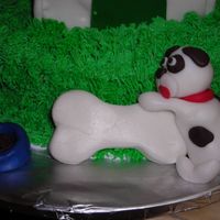 Close Up Of Puppy I molded this puppy out of fondant using Debbie Brown's instructions in her 50 Easy Party Cakes book.