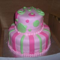 Mary's Birthday Cake This is a french vanilla cake with strawberry filling covered in pink buttercream and pink fondant. I used my new bow cutter to make the...