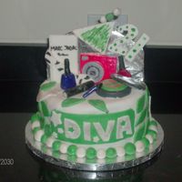 21St Birthday D.i.v.a Yellow cake with Chocolate buttercream. Covered in white fondant with green fondant accents. everything was made out of fondant.