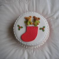 Axmas Stocking this is done in fondent icing with a little flower paste added to keep its shapedone free hand no shapes or cutters