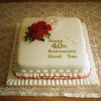 Img023.jpg spray of ruby roses with a tuille ribbon