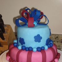 Blue And Red Cake I made this for my sister when she got into grad school - these are the school's colors. It's my first fondant cake after taking...