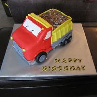 Dump Truck Birthday Cake I made this cake for two little boys' birthdays. Hand carved cake, covered with buttercream and MMF. All MMF detils, candy rocks and...