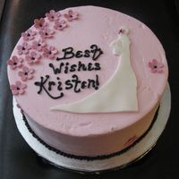 Bridal Shower Silhouette Cake Iced in buttercream with sugarpaste flowers and fondant silhouette