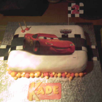 Lightning Mcqueen Fruit cake was supplied and I was asked to do the rest.