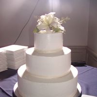 Three Tiered Simple basic design each tiered highlighted with ribbon on the base