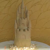 Sandcastle Wedding Cake The cake is all cake or chocolate, white cake with cookies and cream filling, the seashells are all chocolate and the "sand" is...