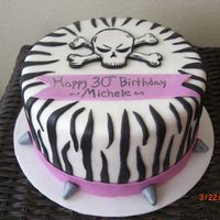 Skull Cake Dark chocolate cake w/ MMF, topper is gum paste w/amricolor for black
