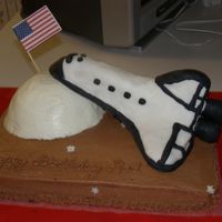 Space Shuttle This is my first 3D cake. Made this cake for my brother who works at NASA. Since turning 40, he's done his best to avoid any type of...