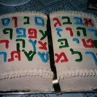 Alef-Beis Book Cake An open book with all the letters of the Jewish Aleph-Bet