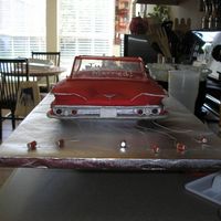 1960 Impala Back This is the back of the Impala cake. I used transparency sheets to make the top of the car. I got miniature soda cans and trailed them from...