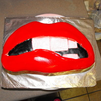 Rocky Horror Lips Cake This is for a 17 yr old having a Rocky Horror Picture Show themed Halloween/Birthday party. I used a 12" round and cut it in half and...
