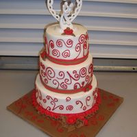 Chocolate Apple Wedding Cake Client wanted a wedding cake with red and brown with the topper.