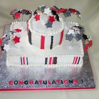 To Celebrate Graduation Cake made for a graduation celebration in school colors... based on a Wilton design. Buttercream with fondant decorations.