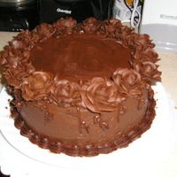 Cat_Muscles_077.jpg I did this cake for my husband and my 1st anniversary. We saved the top of the wedding cake but it was very freezerburnt & we didn'...