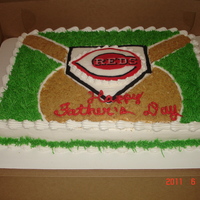 Batter Up! Cincinnati Reds baseball cake made for a HUGE fan! His daughter's planned this all themselves!