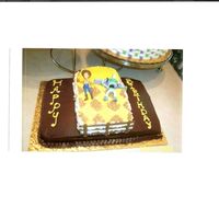 Andys Floor And Bed My grandson wanted buzz and woody for his birthday. I decided to do Andys floor and bed on a sheet cake. Then I did a three tier for the...