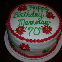 Christmas Birthday All buttercream. Poinsettas and holly helped decorate this holiday birthday cake.