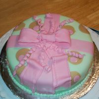 Wilton Class Iii, First Fondant Cake I really had fun using fondant for the first time! I love the way it looks. The bow was really hard for me though, and it's a bit...