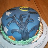 Halloween Night Vanilla caramel cake (flavored with caramel coffee creamer) with dulce de leche filling and iced in buttercream. Covered and decorated with...