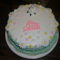 Easter Basket Of Flowers This was my first time making royal icing daisies (made them at my cake decorating class) and first time making a rope border. Also, it was...