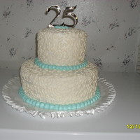 Happy 25Th Anniversary! This was the cake that I made for my Dad and Step-Mom for their 25th Anniversary. I also helped make their original Wedding cake...when I...
