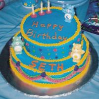 Care Bear Birthday! My son loved these guys around his 3rd birthday and I couldn't find a bear pan. I made a 2 tier (A 10 and 6 inch) and used buttercream...