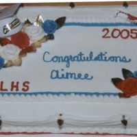 Graduation Cake This was fun. The customer supplied a picture and I made it. I was a little concerned with the gold leaves at first, but when it was done...