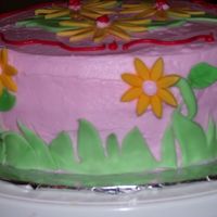 Cake For My Neice Buttercream icing w/ fondant grass and flowers.