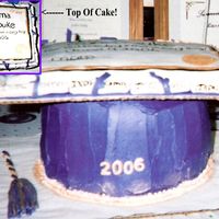 Graduation Morter Cap And Certificate Cake! This cake was made for my son's graduation party. Purple and Gold are the school colors. Buttercream with fondant decorations...
