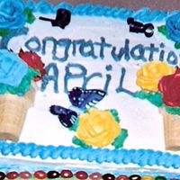 Flower Pot Theme Cake!! A graduation cake covered in buttercream and decorated with buttercream flowers and ice cream cones used as flower pots! My client was...