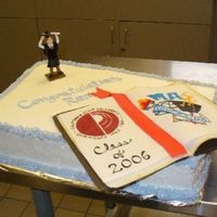 Graduation Cake This was a cake I made for husband who earned his master's degree. The cake is iced with Frostin Pride/Pastry Pride. the "book is...