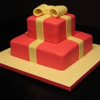 "the Perfect Gift" A sweet & simple cake baby shower cake. Vanilla bottom "present", Swiss Chocolate top "present", all MMF