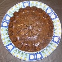 Cake For Husband Chocolate cake, chocolate butter icing, rolo and caramello chocolates and chocolate sprinkles to decorate.