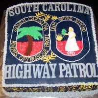 Highway Patrol Retirement All buttercream with fondant lettering. Lots of black and blue color to make navy blue background