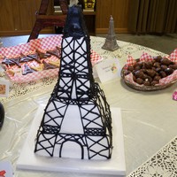 Eiffel Tower Eiffel Tower cake, made for nephew's birthday, bottom 4 layers stacked white and strawberry cake, top is rkt covered all buttercream....