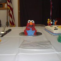 Personal Elmo I made this personal elmo for my sons first birthday and it didn't take him long to dismember it.This was made with the mini stand up...