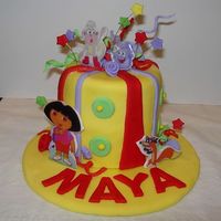 Dora Birthday Cake This is taken by an idea by Sugarshack. It was for a friends little girl's first birthday party. It is a dora theme. Fondant covered....
