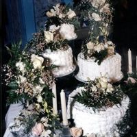 Basket Weave With Fresh Flowers This is the right photo, I hope. I made this cake a few years ago when the basket weave cake was really popular. This cake was four tiers...