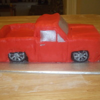 Chevy Pickup This is a truck make with cake and RKT. It is covered in Fondant, the window are "painted" silver.