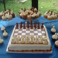 Dylans 9Th Birthday Did this for my son. He loves chess. WASC with strawberry filling. Chocolate and vanilla cupcakes.