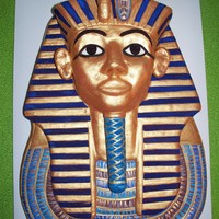 Tut's Burial Mask Almond pound covered in fondant and painted with lustre dust and petal dust with extract. Made for Egyptian Day at my daughter's...